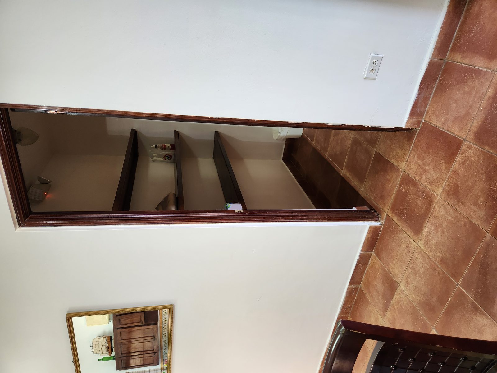 Access to Half Bathroom & Storage Area